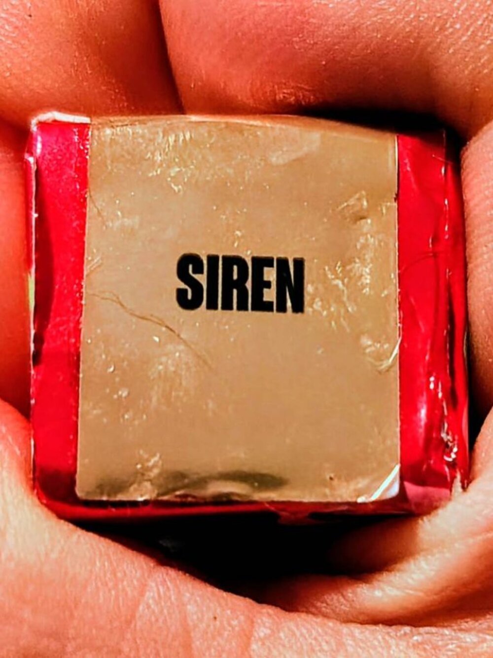 Lime Crime’s Siren is a metallic liquid matte lipstick